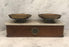 Antique wooden scale with a white marble top and bronze scales