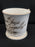 Antique white porcelain mug with gold writing
